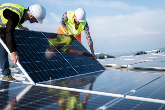 Men installing solar panels